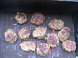 Lamb Kofte's cooking on a Teflon BBQ grill mat